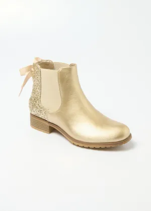 Chelsea boots with fancy heels and bow
