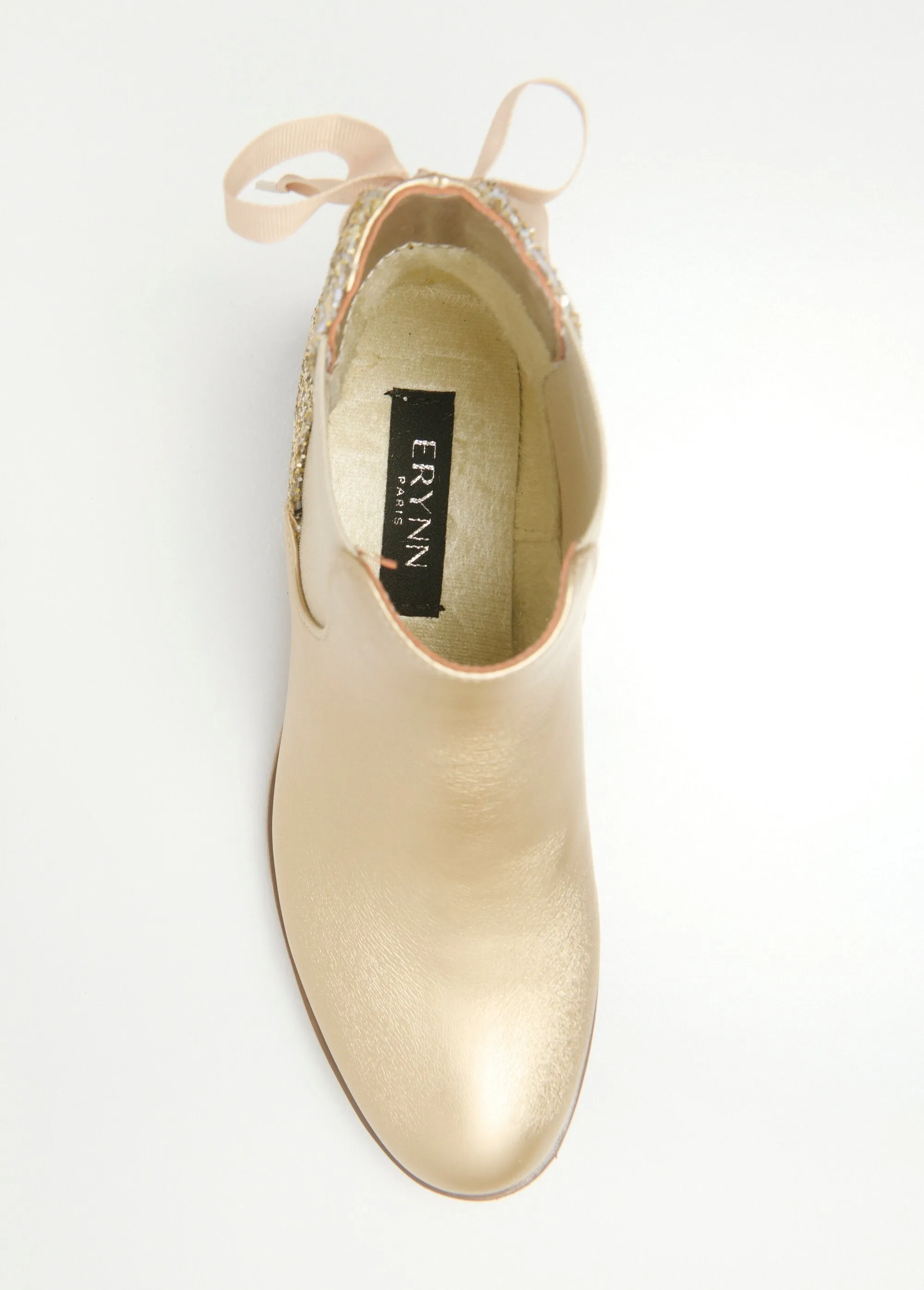 Chelsea boots with fancy heels and bow